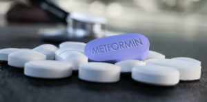 Blue Metformin Pill on Table