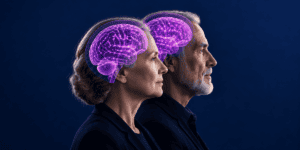 The heads of a man and woman look to the right while the brain of each is shown as a hologram